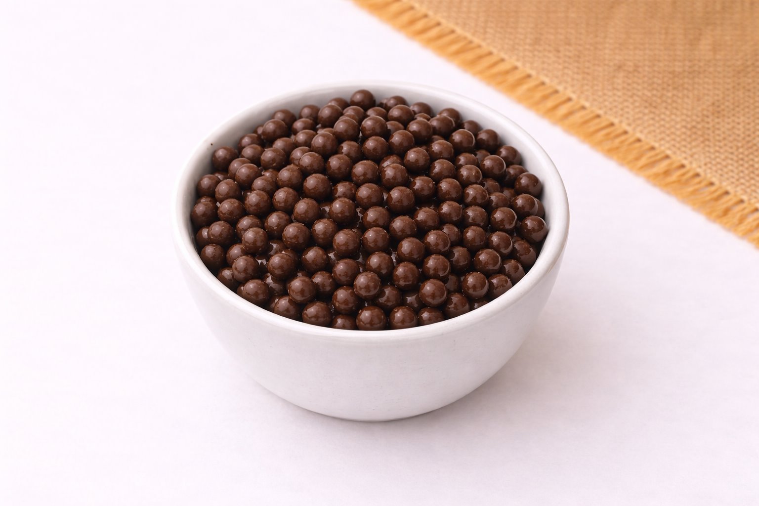 Quinoa con chocolate a granel. Visita nuestra tienda en línea y compra tus snacks, botanas, nueces.